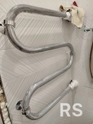 Перенесите полотенцесушитель с врезкой в ​​существующую трубу.