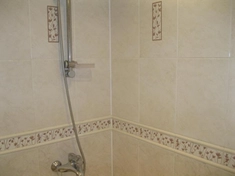 Укладка плитки в ванной по дизайну