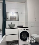 Облицовка санузла под ключ, монтаж душевого поддона, установка чистовой сантехники.