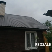 На фото замена кровли из шифера на профнастил.