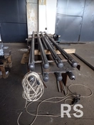 На фото представлены готовые регистры отопления, изготовленные из стальных труб и подготовленные к установке. Все элементы сварены и обработаны, что обеспечивает надёжность и долговечность системы.